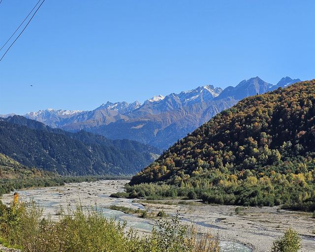 A mountain river in the Racha valley against a ridge